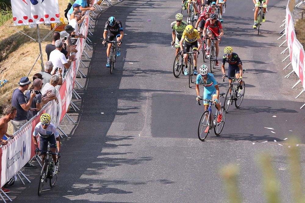 The top GC contenders make their way to the finish during stage 14.
