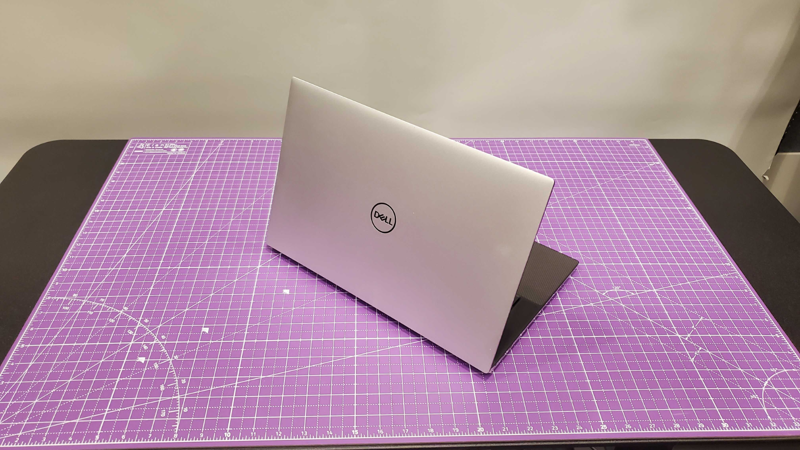 Dell XP 15 on a purple mat during our tests
