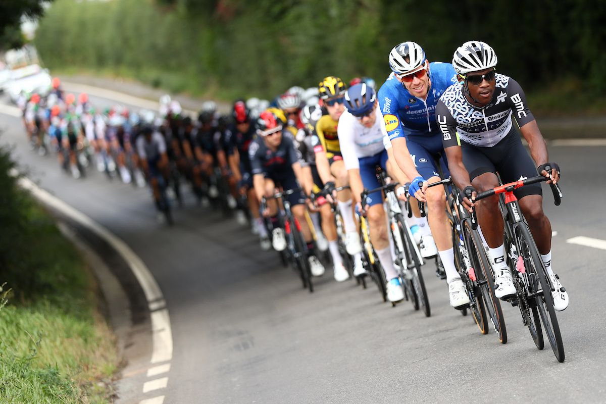 Picture by SWpix.com - 09/09/2021 - Cycling - AJ Bell Tour of Britain Stage 5 - Alderley Park to Warrington, England - Nic Dlamini of Team Qhubeka NextHash at the front of the peloton