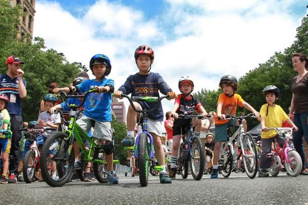 Being Fathers Day, we get our priorities in order and the kids line up first. This is the 39th year for the Skyscraper founded by David Walker which is designed to attract children to cycling safety through the excitement of professional racing in NYC.
