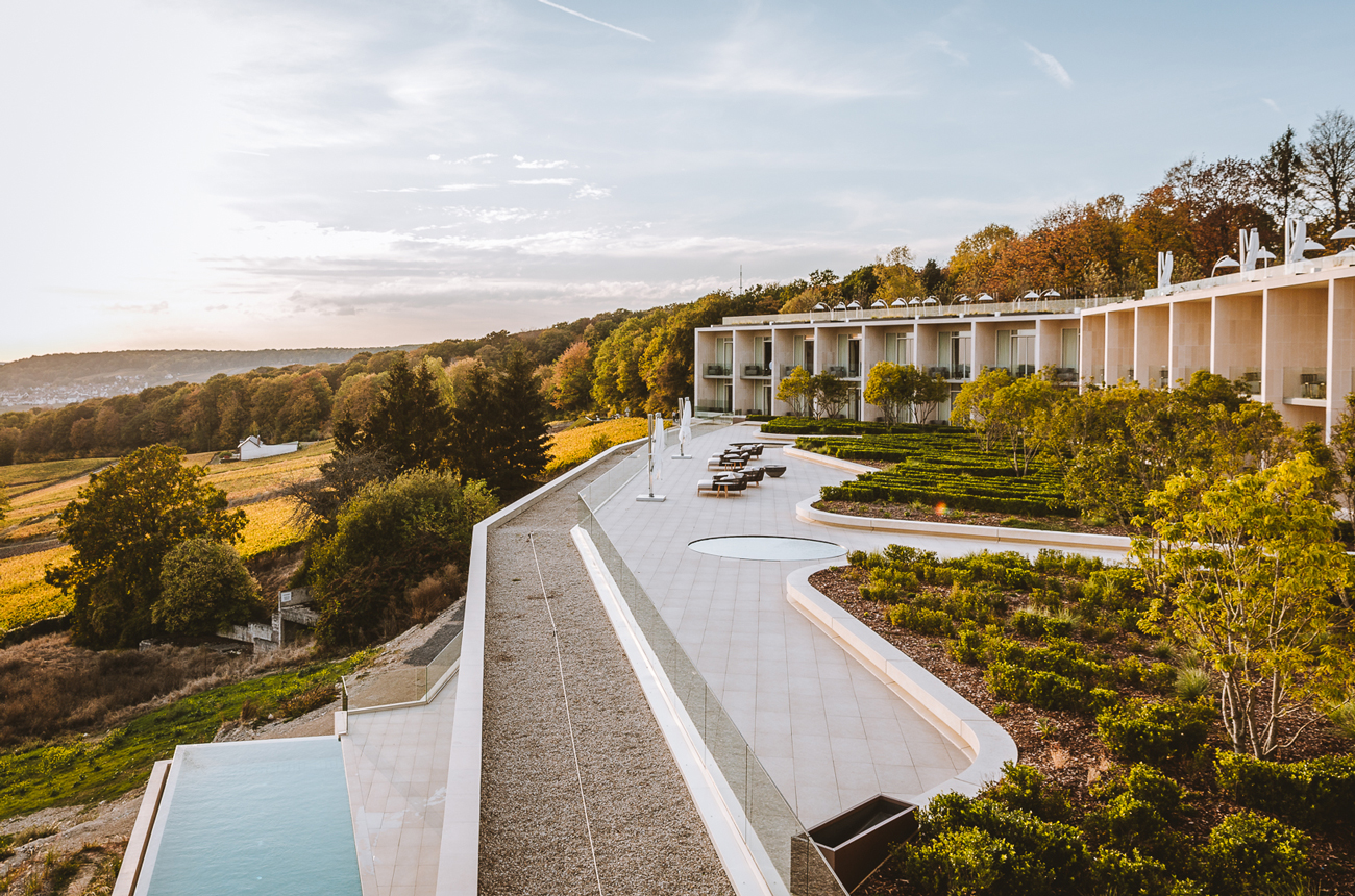 Hotel rooms, terrace and swimming pool overlooking vineyards