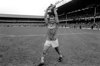 Peter Reid celebrates winning the league with Everton