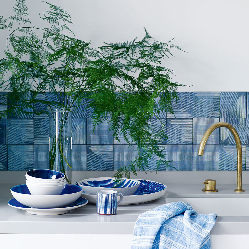 kitchen with washbasin and plant vase