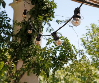 Festoon lights hung in a gazebo