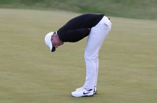 Rory McIlroy reacts after his missed putt on the 18th at the Irish Open