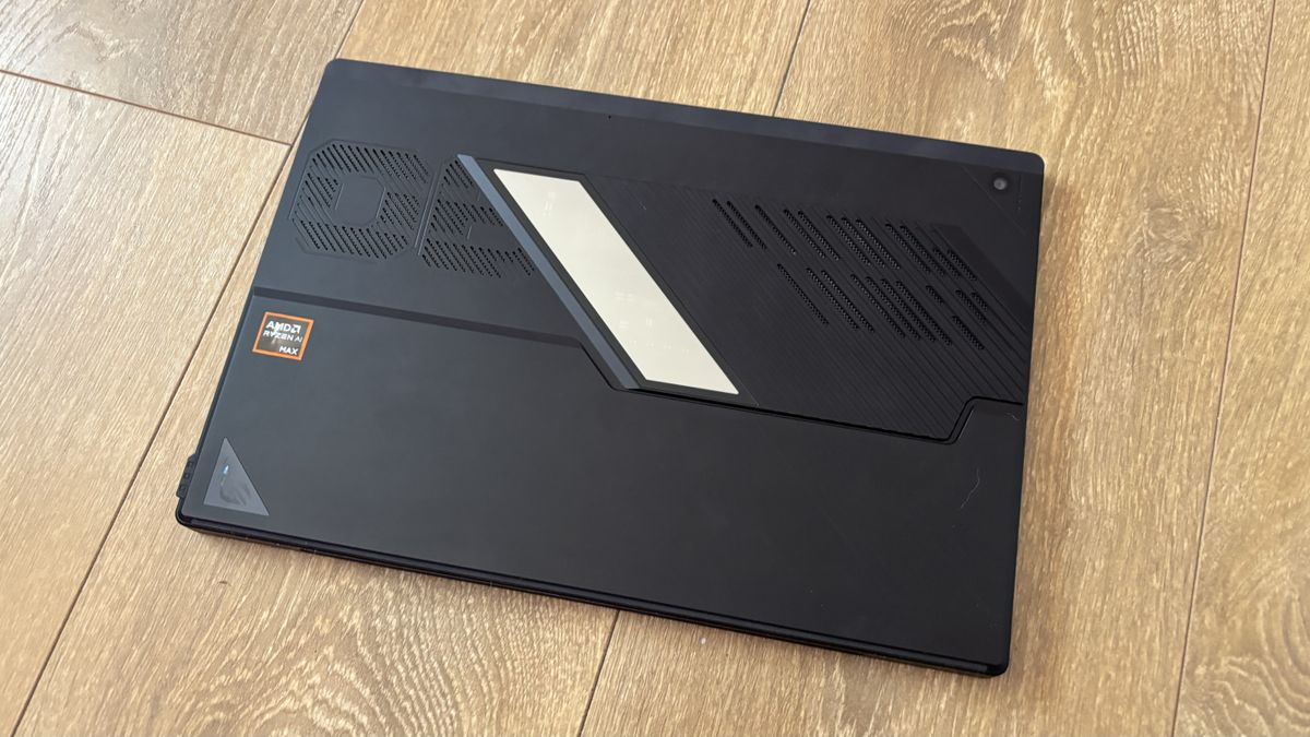Asus ROG Flow Z13 gaming tablet on wooden surface