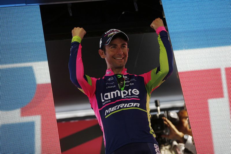 Diego Ulissi celebrates stage victory on the podium