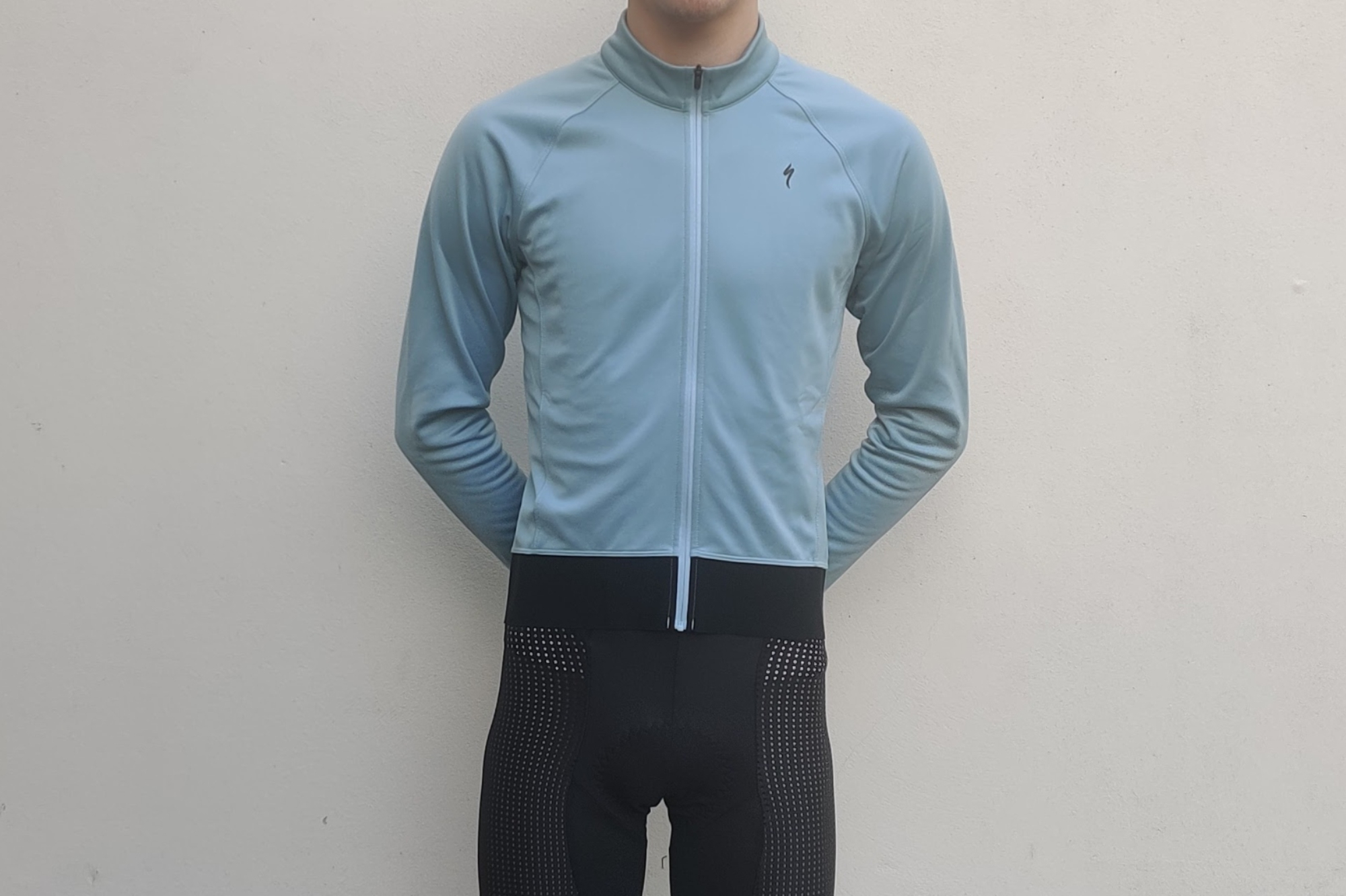 Male cyclist wearing the Specialized Expert Thermal Long Sleeve Jersey.