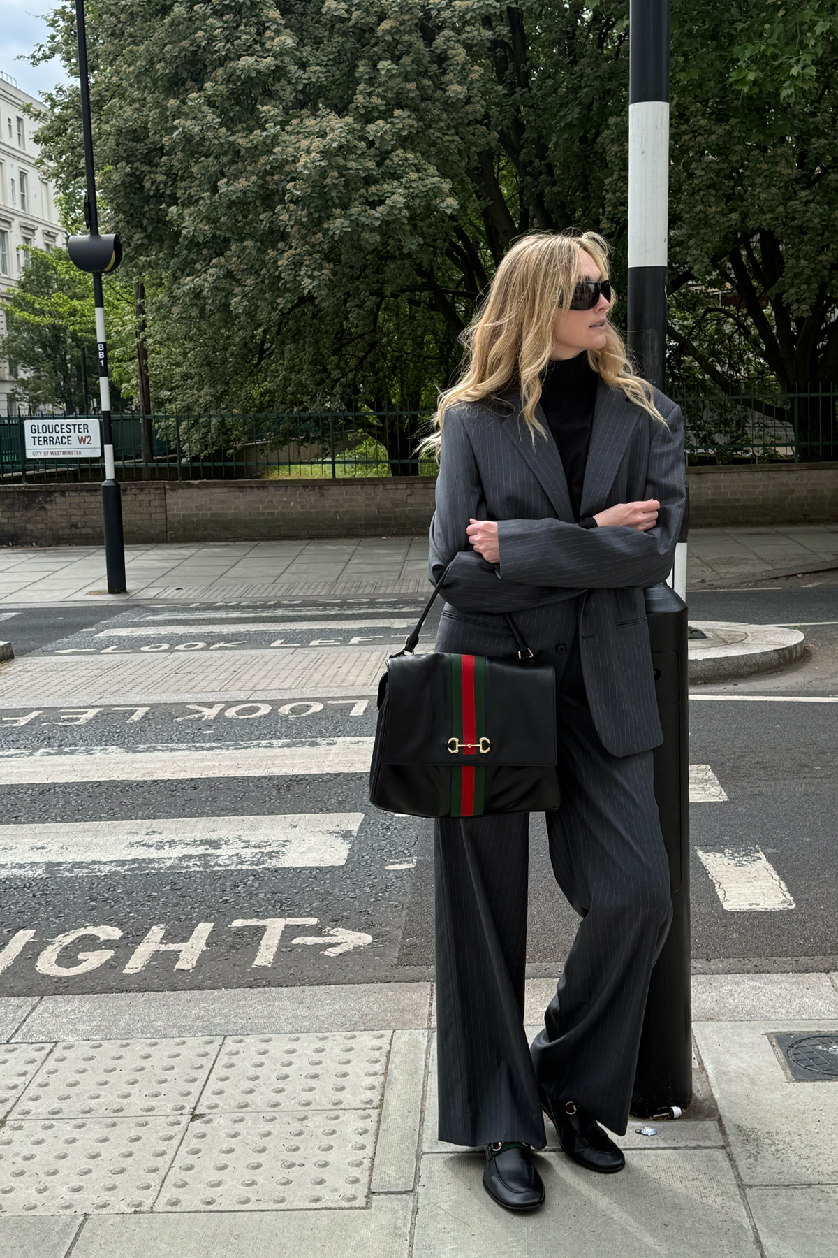 Jane McFarland carrying the Gucci Paparazzo bag