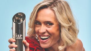 Beth Cordingly holding a British Soap Award.