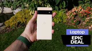 Man holdling Pixel 6 Pro outside with green foliage and flowers in the background