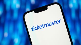 Ticketmaster app open on a smartphone with a blue background