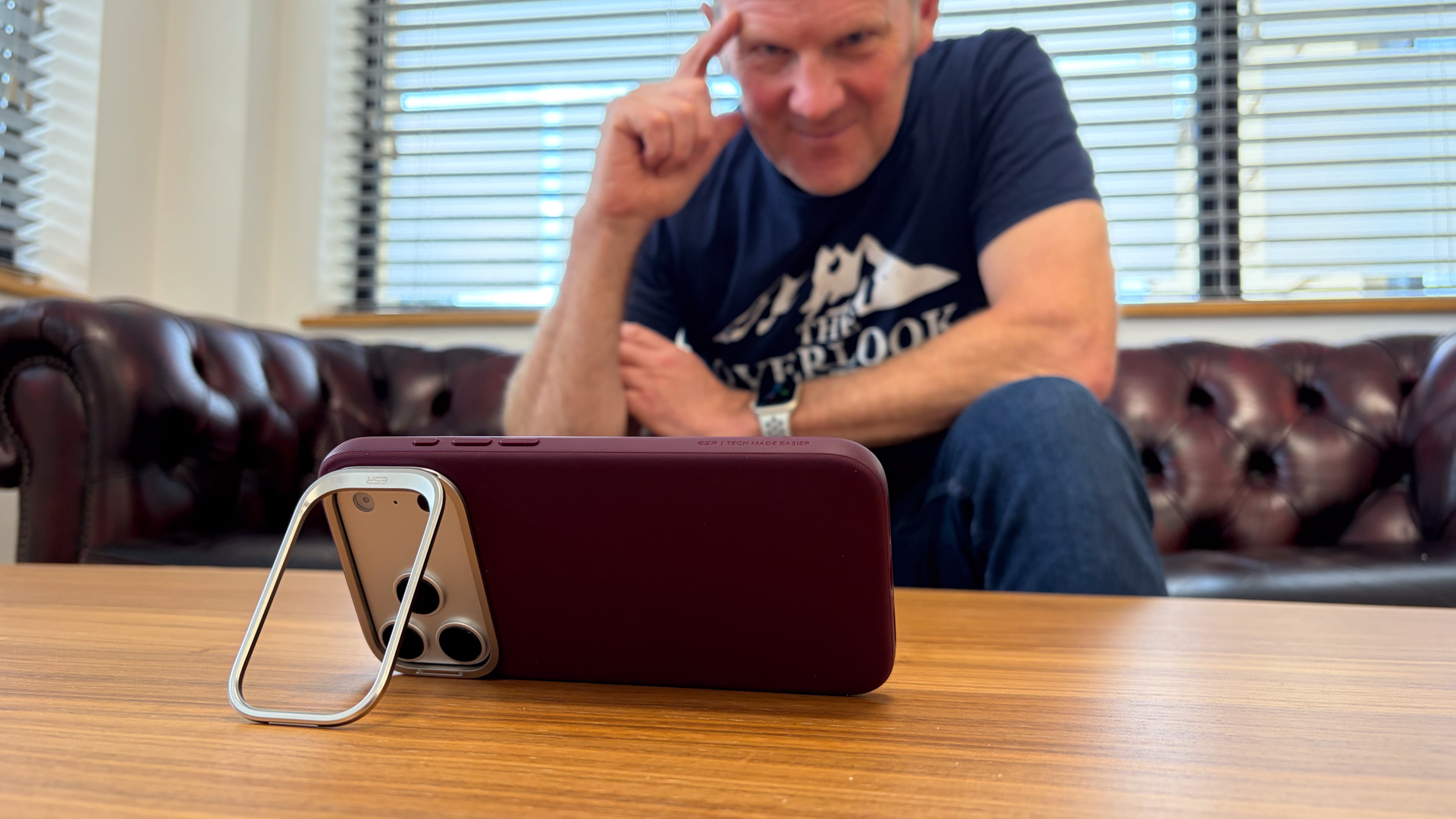 Person using an iPhone 18 Pro Max in an ESR case