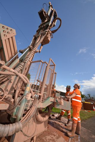 a borehole being drilled for a vertical array ground source heat pump
