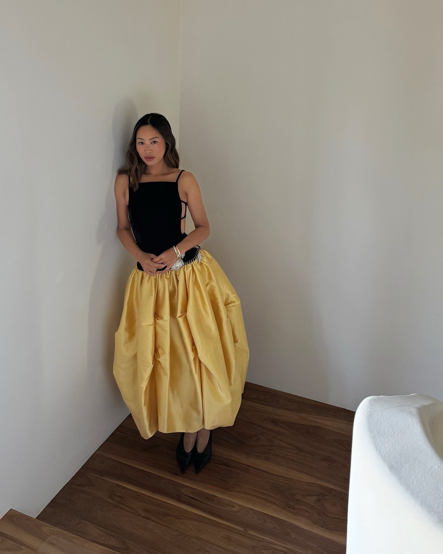 An image of @aimeesong wearing one of the key summer dress trends for 2025.