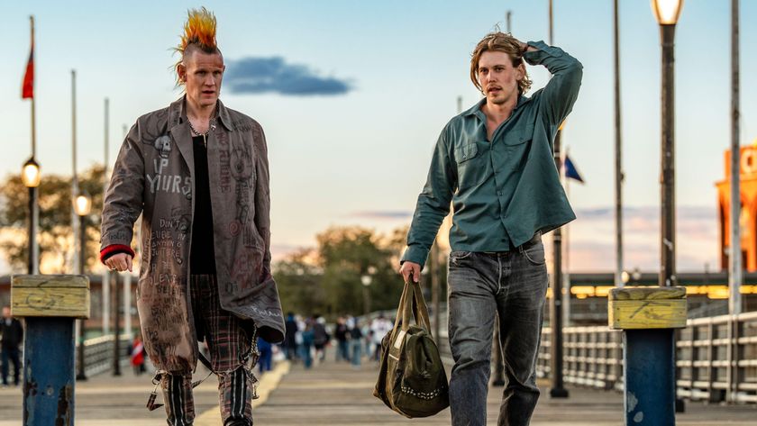 L-R: Russ (Matt Smith) and Hank (Austin Butler) walk side-by-side in a scene from &quot;Caught Stealing&quot;