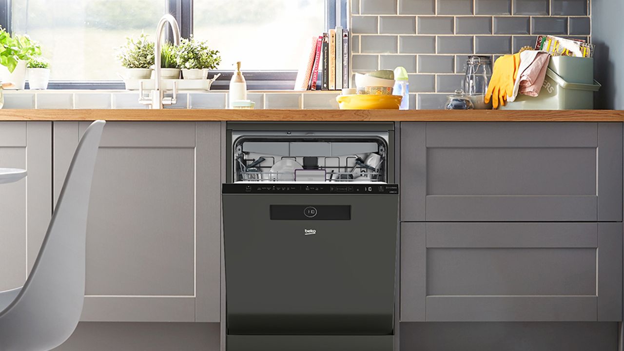 Beko washing machine built in to grey kitchen cabinetry