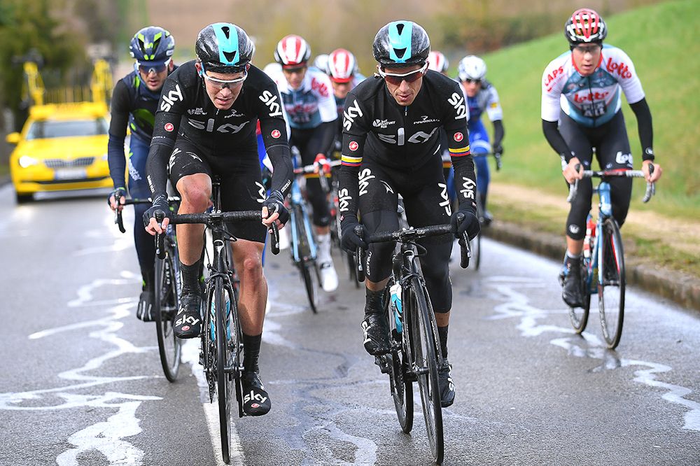 Team Sky riders endure the wet conditions