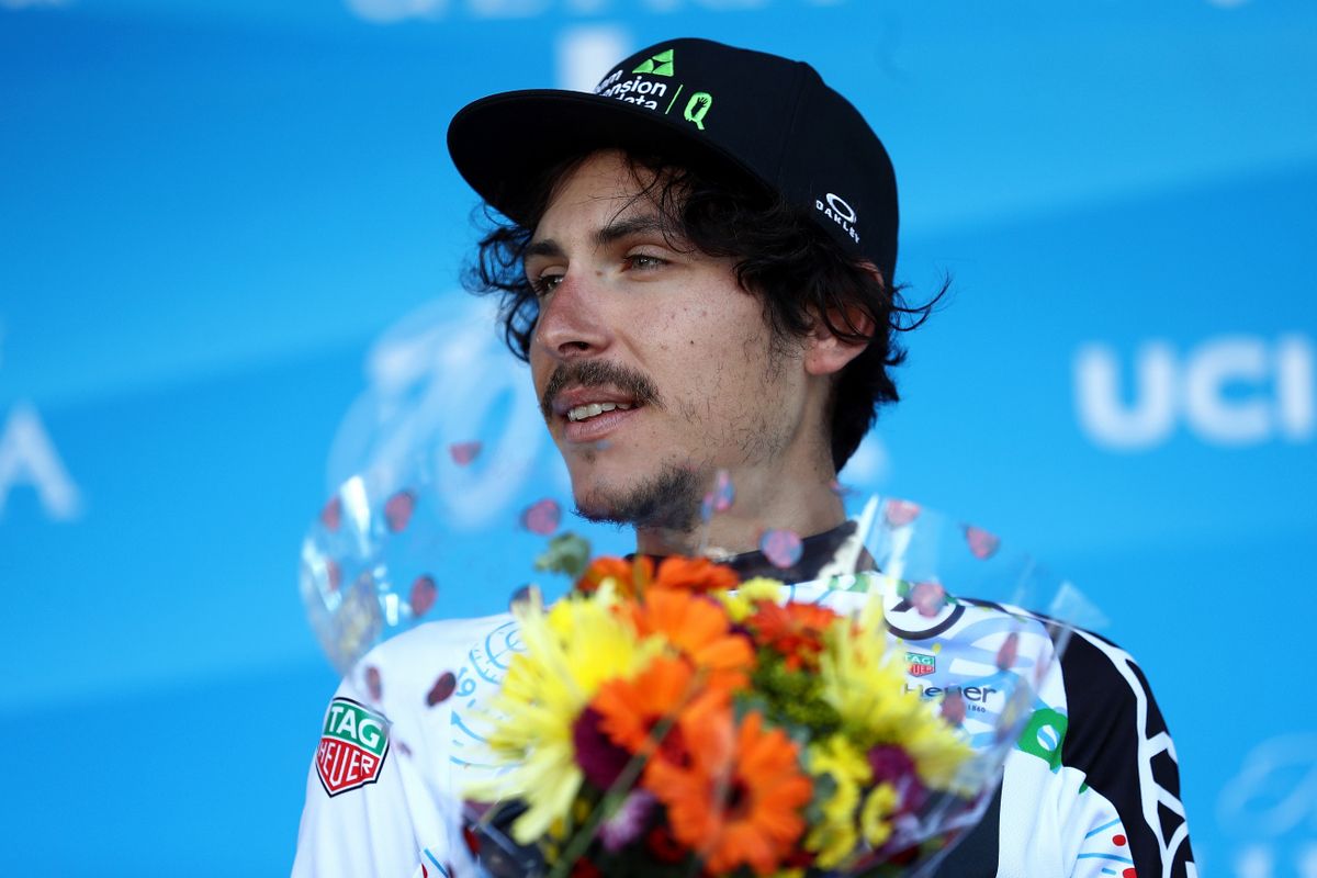 Lachlan Morton holds onto the young rider jersey