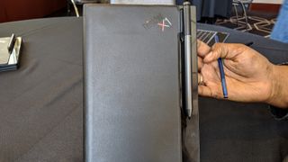 The foldable ThinkPad X1 PC when closed looks like a notebook.