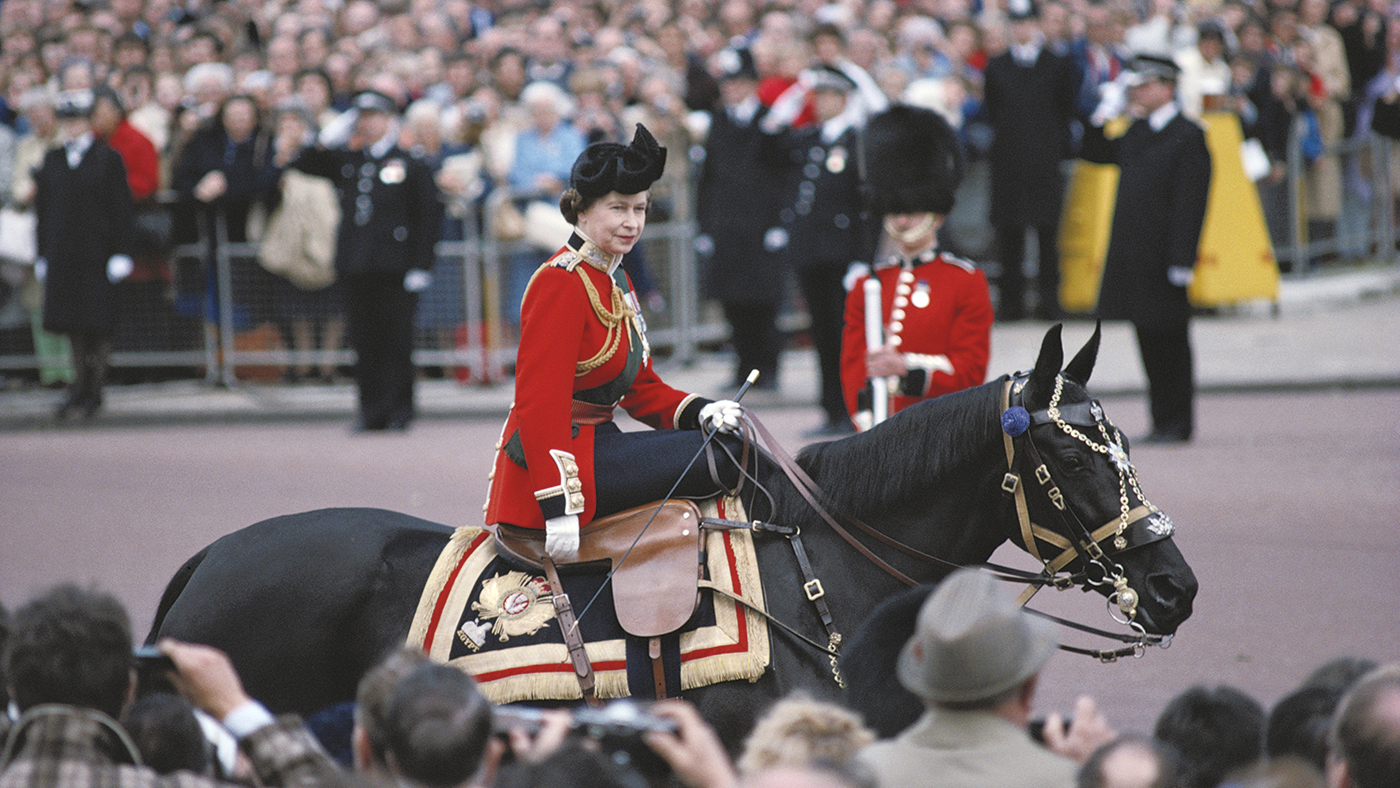 Queen Elizabeth II rides Burmese, one of The Queen's most famous horses, during Trooping The Colour
