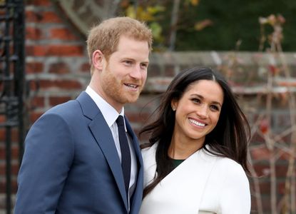 Meghan Markle and Prince Harry pose shortly after their engagement