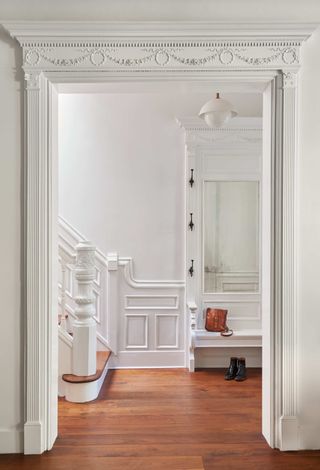 An entryway with white paint