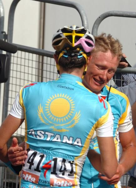 Alberto Contador congratulates teammate and race winner Alexandre Vinokourov.