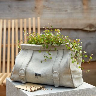 witty concrete furniture and accessories with gladstone bag plant pot and concrete side table