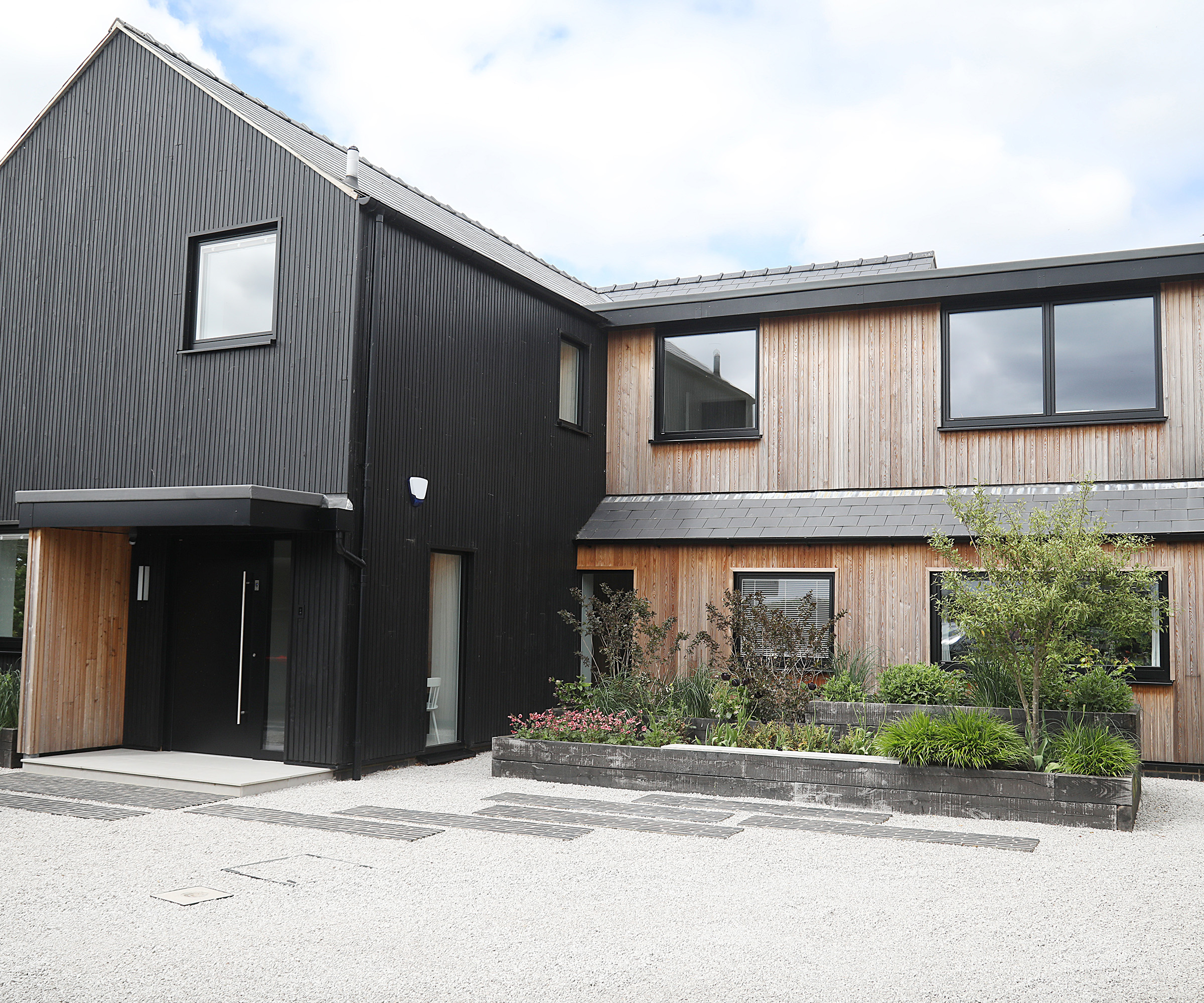 The front exterior of a newly renovated 1980s home