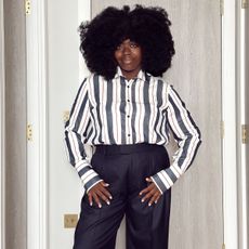 Stephanie Yeboah wearing a shirt and trousers from With Nothing Underneath