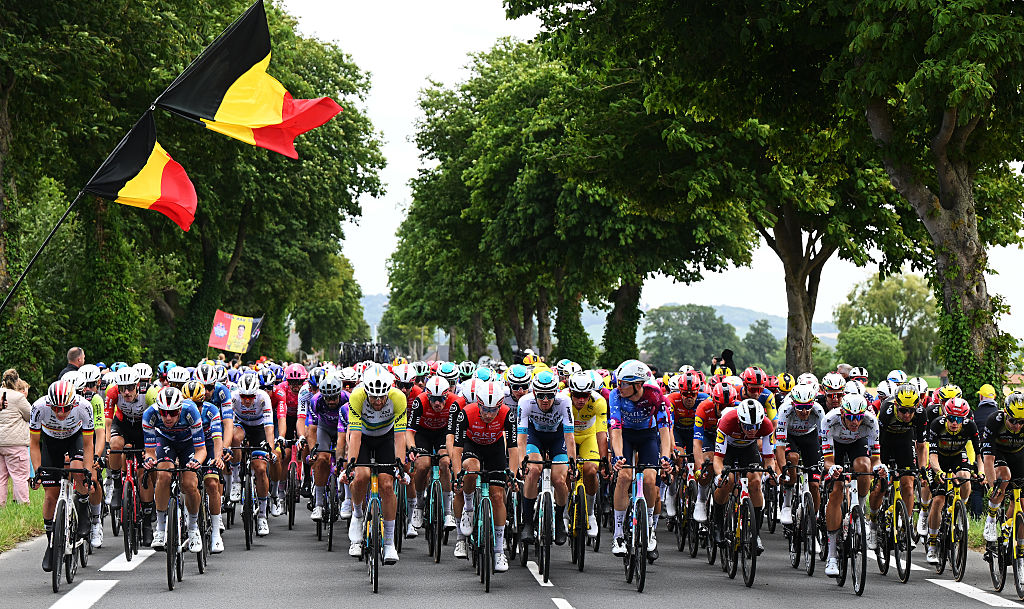 DUNKERQUE, FRANCE - JULY 07: A general view of Mathieu Van Der Poel of Netherlands and Team Alpecin - Deceuninck - Yellow leader jersey and the peloton competing during the 112th Tour de France, Stage 3 a 178.3km stage from Valenciennes to Dunkerque / #UCIWT / on July 07, 2025 in Dunkerque, France. (Photo by Dario Belingheri/Getty Images