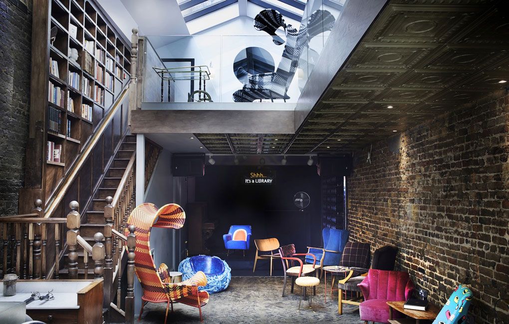 Library with wooden stairs and chairs