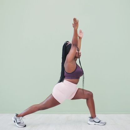 Best home arm workouts: A woman working out at home
