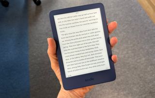 Kindle being held in one hand