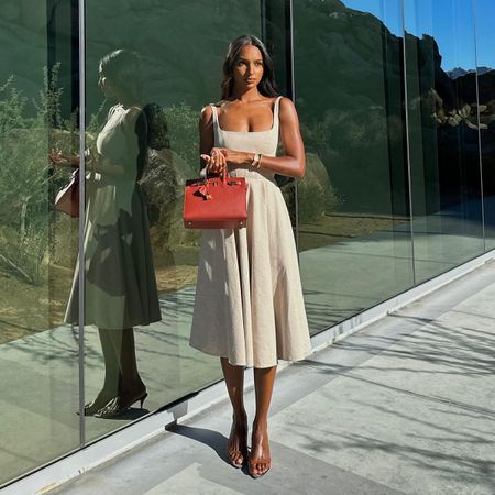 Jasmine Tookes wearing an A-line dress