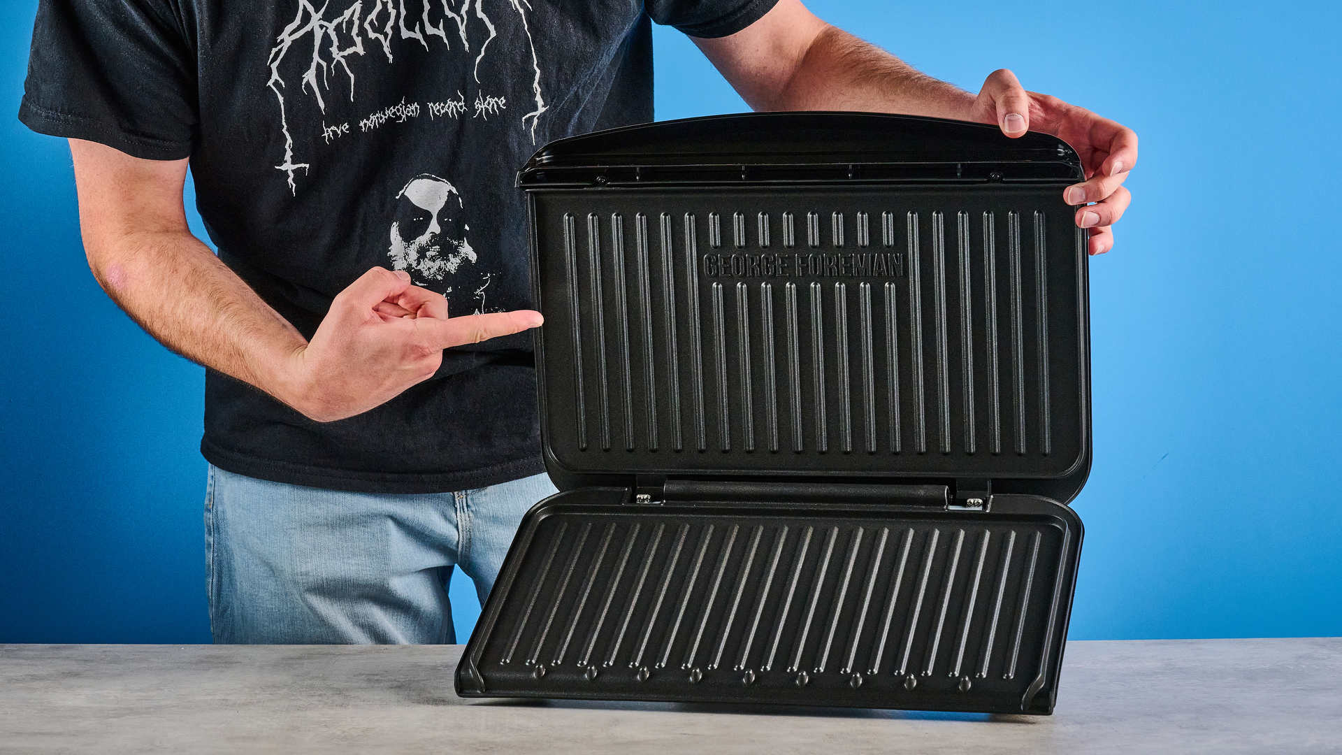 The George Foreman grill against a blue background