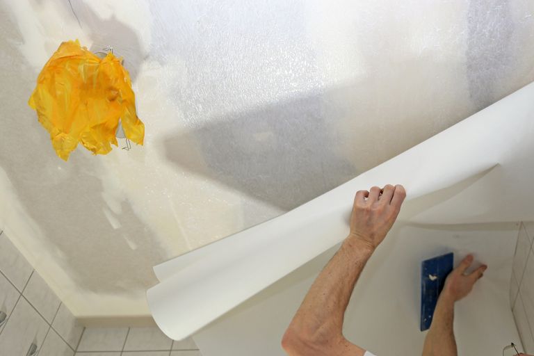 Wallpapering a ceiling