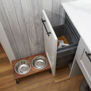 Light grey shaker kitchen with drawer for dog food.