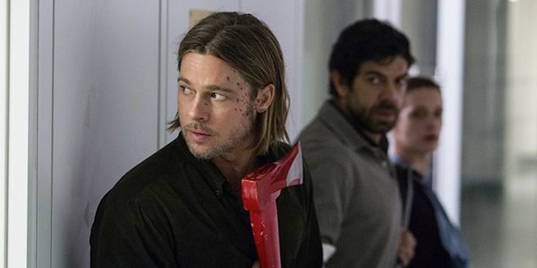 Brad Pitt&#039;s Gerry Lane looking cautiously around a corner in World War Z