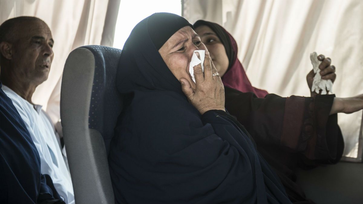 Relatives of passengers aboard the missing EgyptAir plane are taken to Cairo airport