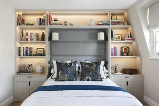 Bedroom with built in joinery around bed