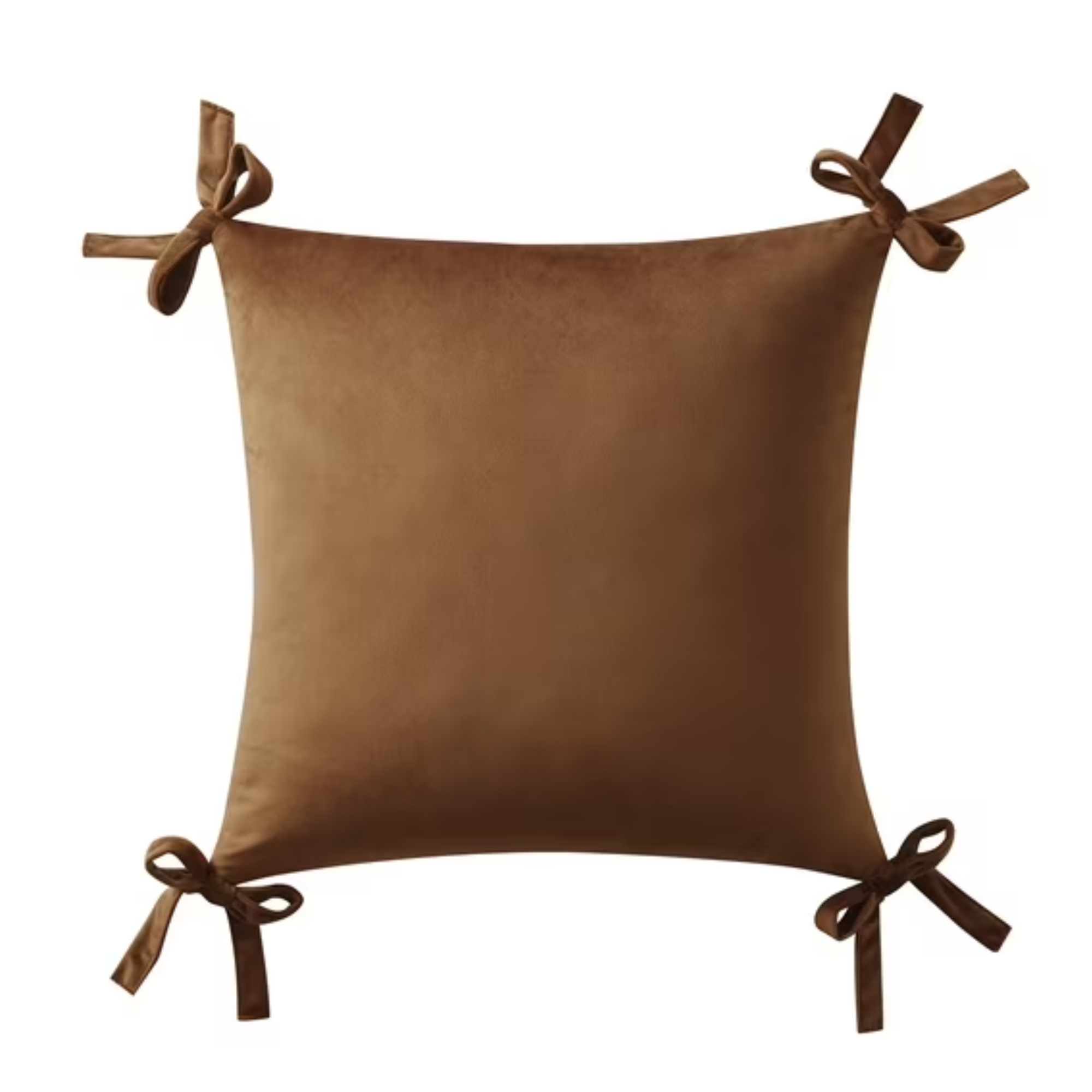 a brown pillow with bows on each corner