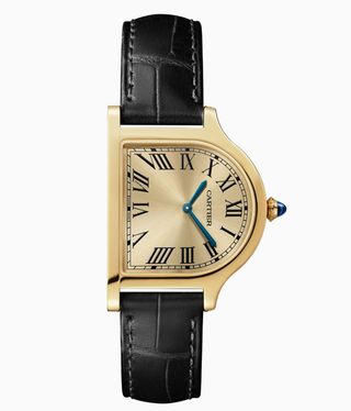 Close up of the Yellow Gold Cartier Prive Cloche de Cartier watch