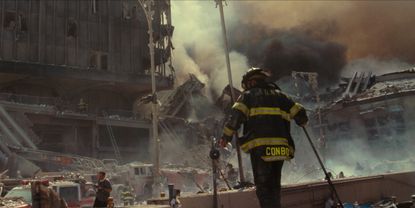 Turning Point: 9/11 and the War on Terror- A first responder digs through the remains of the fallen WTC towers from the episode