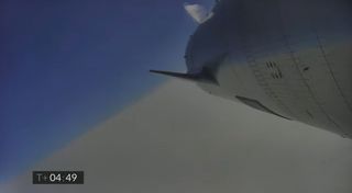 SpaceX's Starship SN15 rocket prototype launches on a 10-kilometer test flight from SpaceX's Starbase test site near Boca Chica Village in South Texas on May 5, 2021.