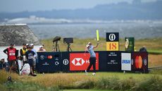 Xander Schauffele hits a tee shot on the 18th at The Open