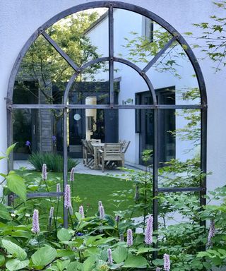 arched garden mirror