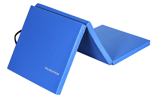 A blue extra thick folding exercise mat.