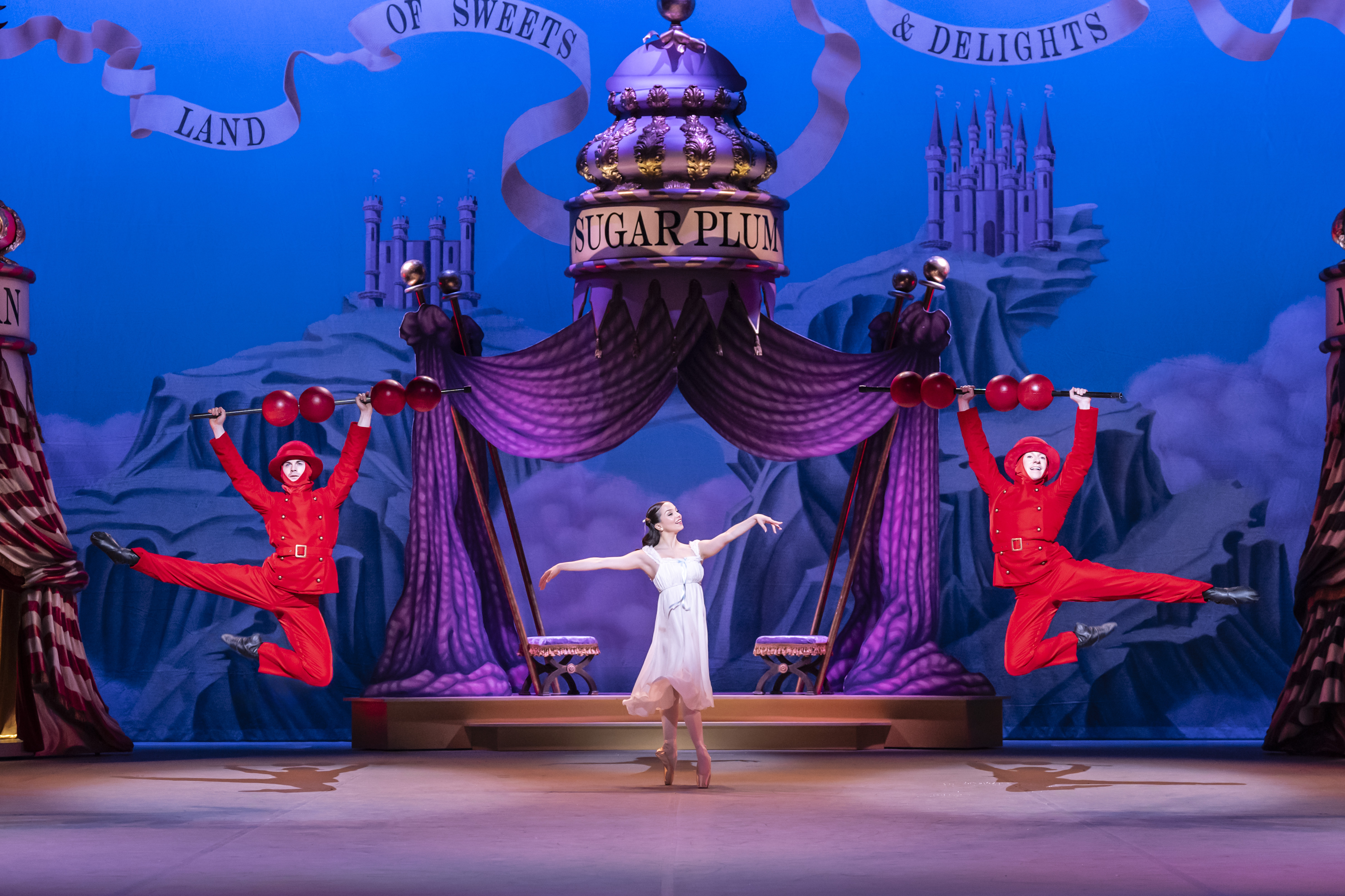 Matthew Astley and Rhys Antoni Yeomans in Tanghulu and Ivana Bueno as Clara in Aaron S. Watkin and Arielle Smith's Nutcracker